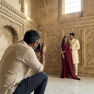 kept them tiny against that wall on purpose. the architecture is the third person in this love story
