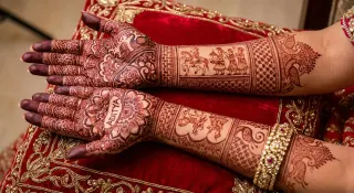 Aaradhya's full bridal, both arms to the elbow. zoom into the baraat near the wrist 👀 he found his name in 20 mins